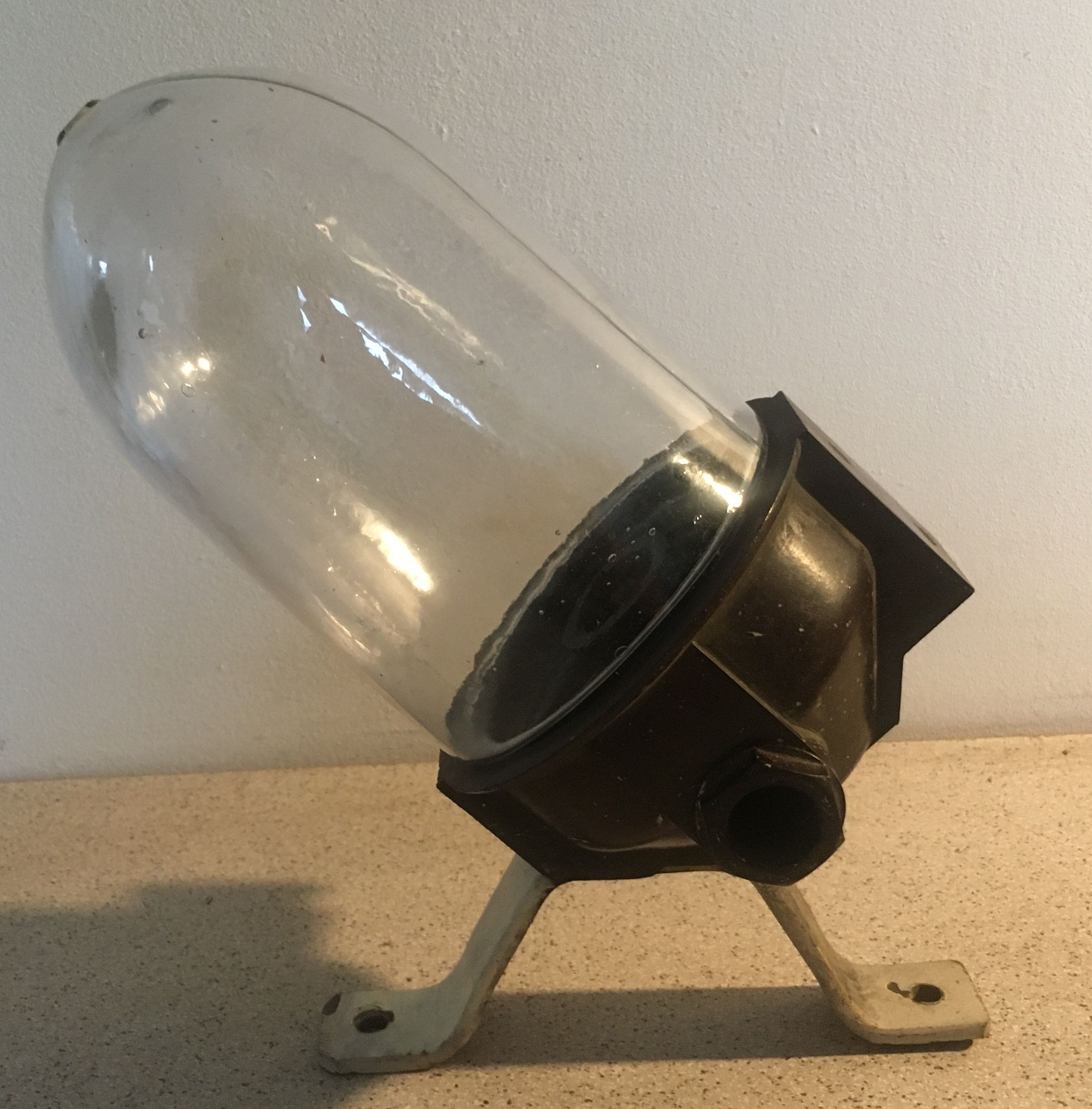 Bakelite courtyard or factory wall lamp with its glass