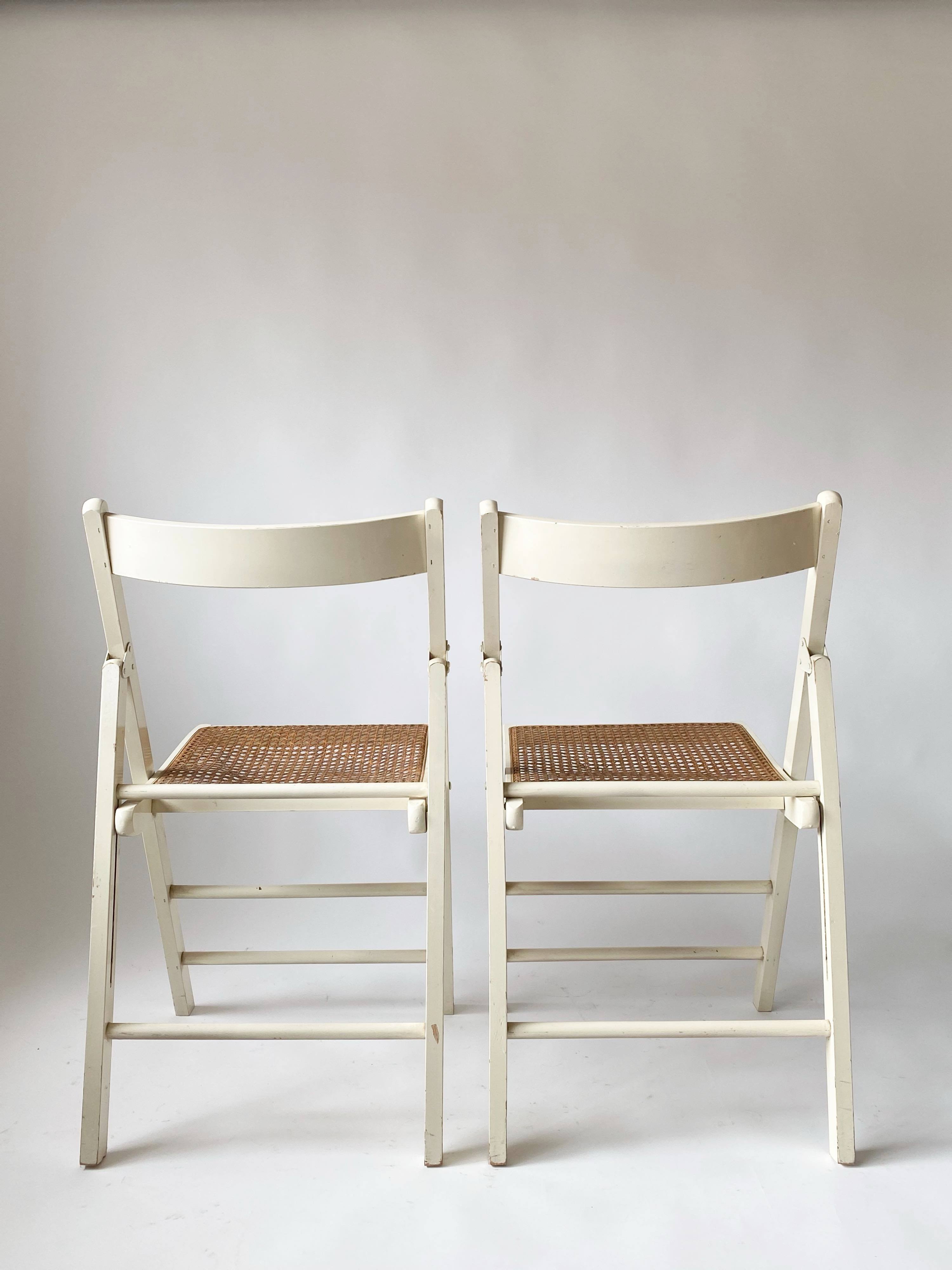 Pair folding chairs caning