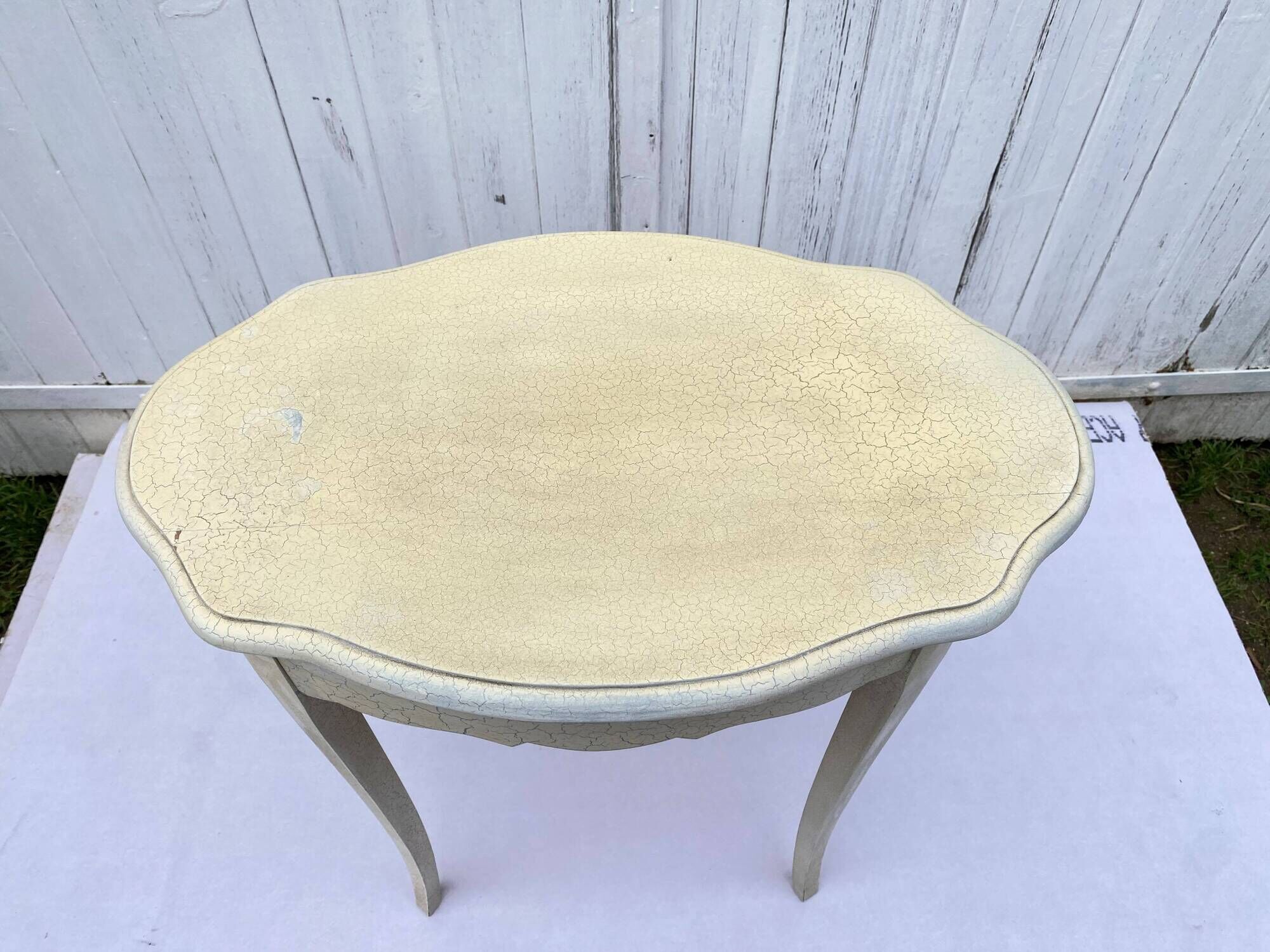 Eggshell-coloured drawer with a cracked effect side table.