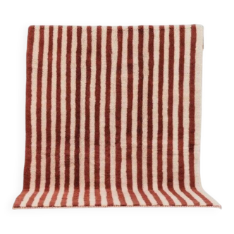 A handmade Moroccan striped terracotta rug, 150/250cm