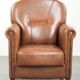Armchair made of sheepskin leather with refined decorative nail finish