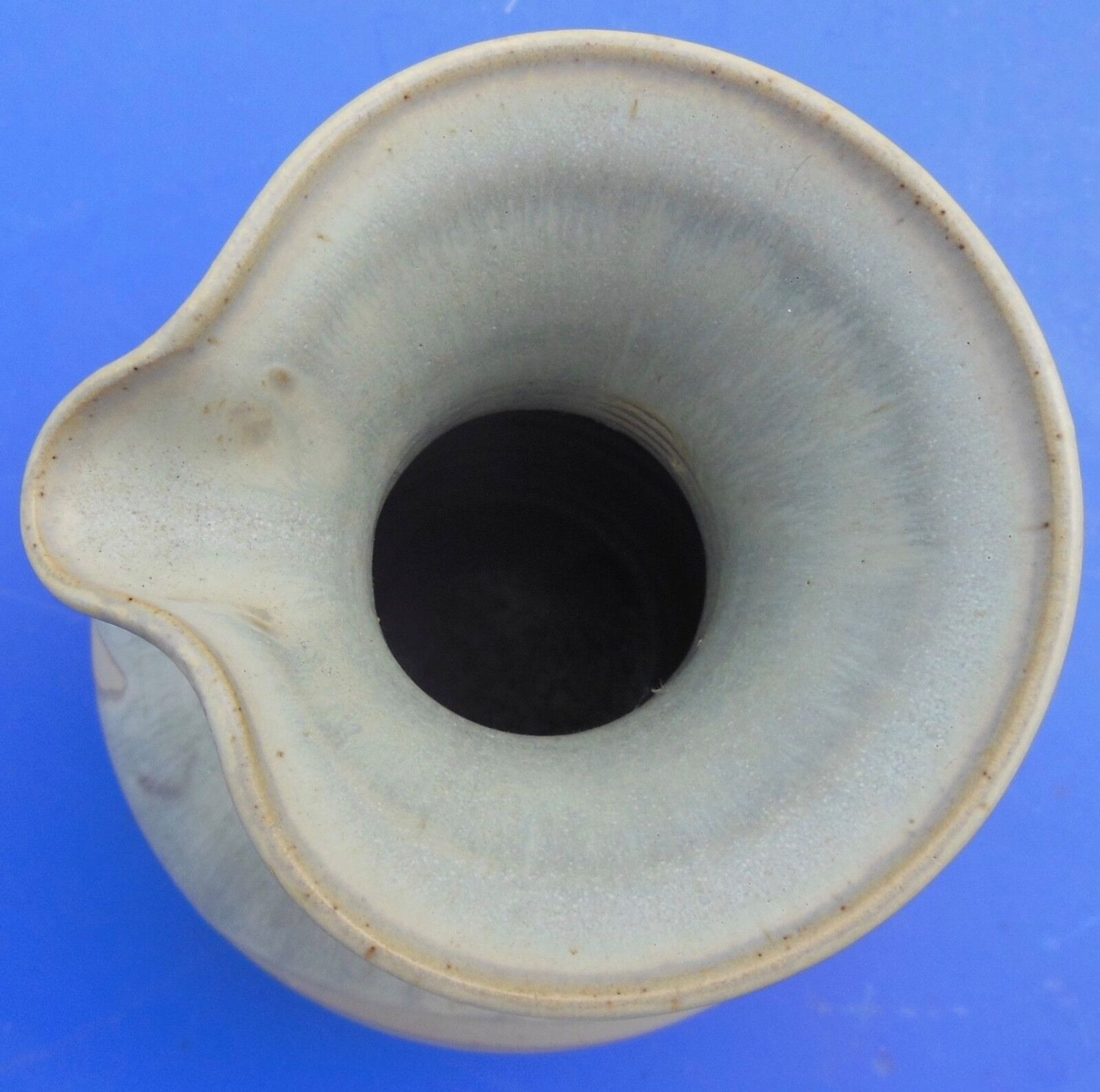 Pitcher or vase in glazed ceramics, signature to identify