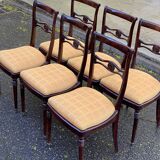 6 dining chairs made of solid mahogany in Regency style with yellow fabric.