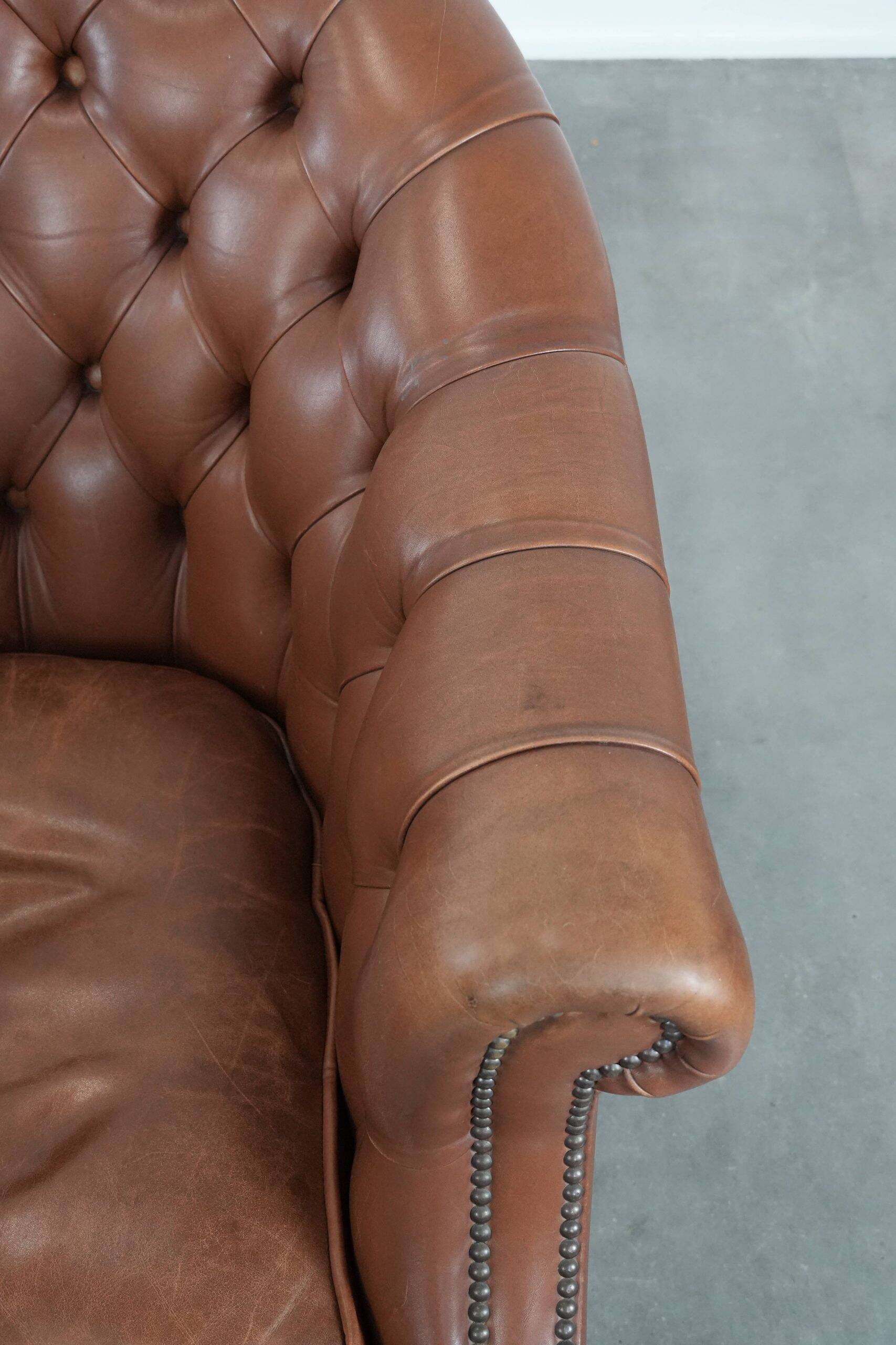 Chesterfield club armchair made of cowhide leather in English style