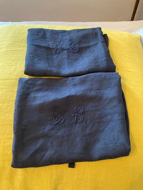 Pair of black monogrammed towels
