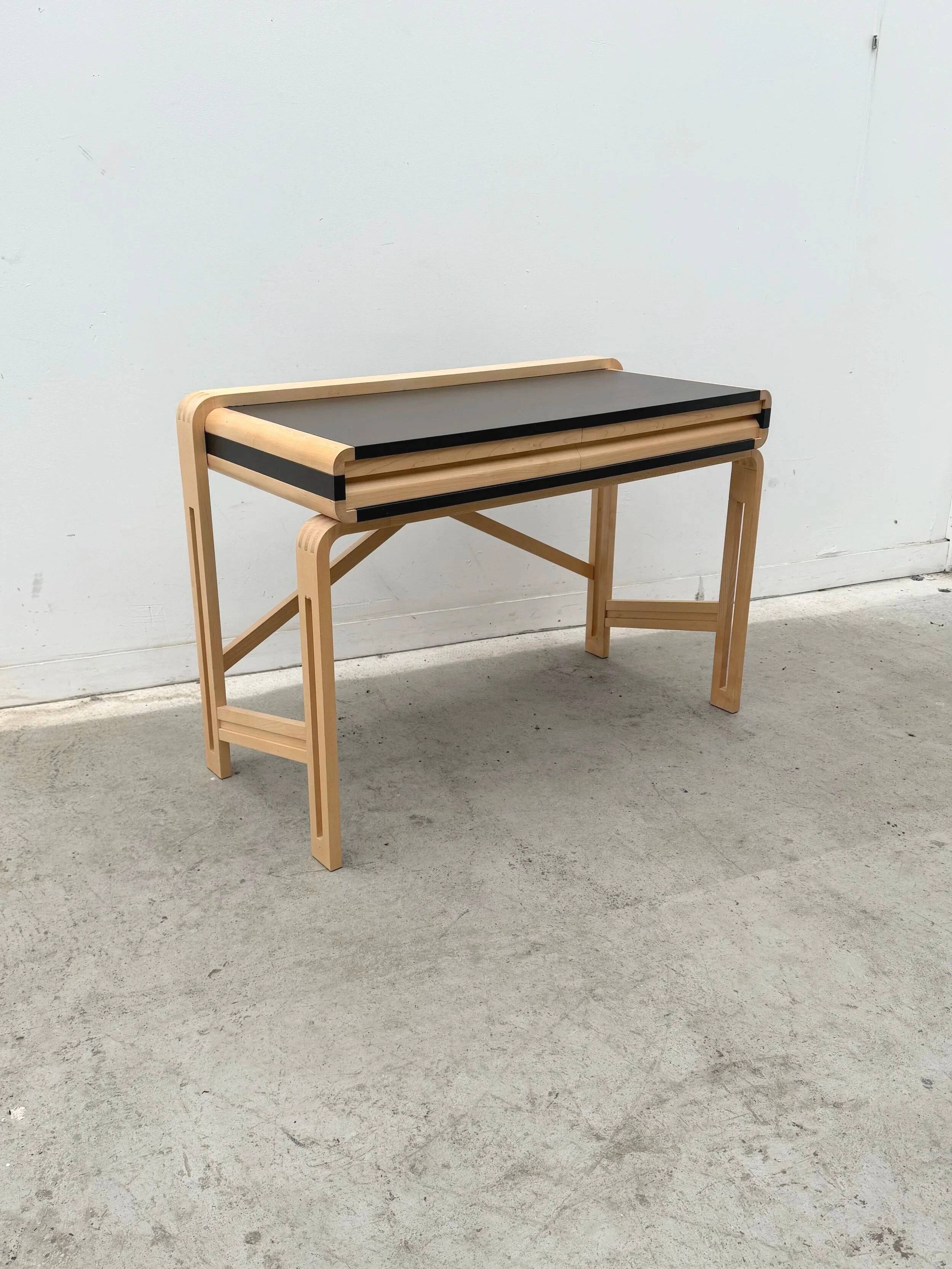 Solid wood and formica desk made by a cabinetmaker.