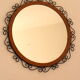 Round iron and rattan mirror