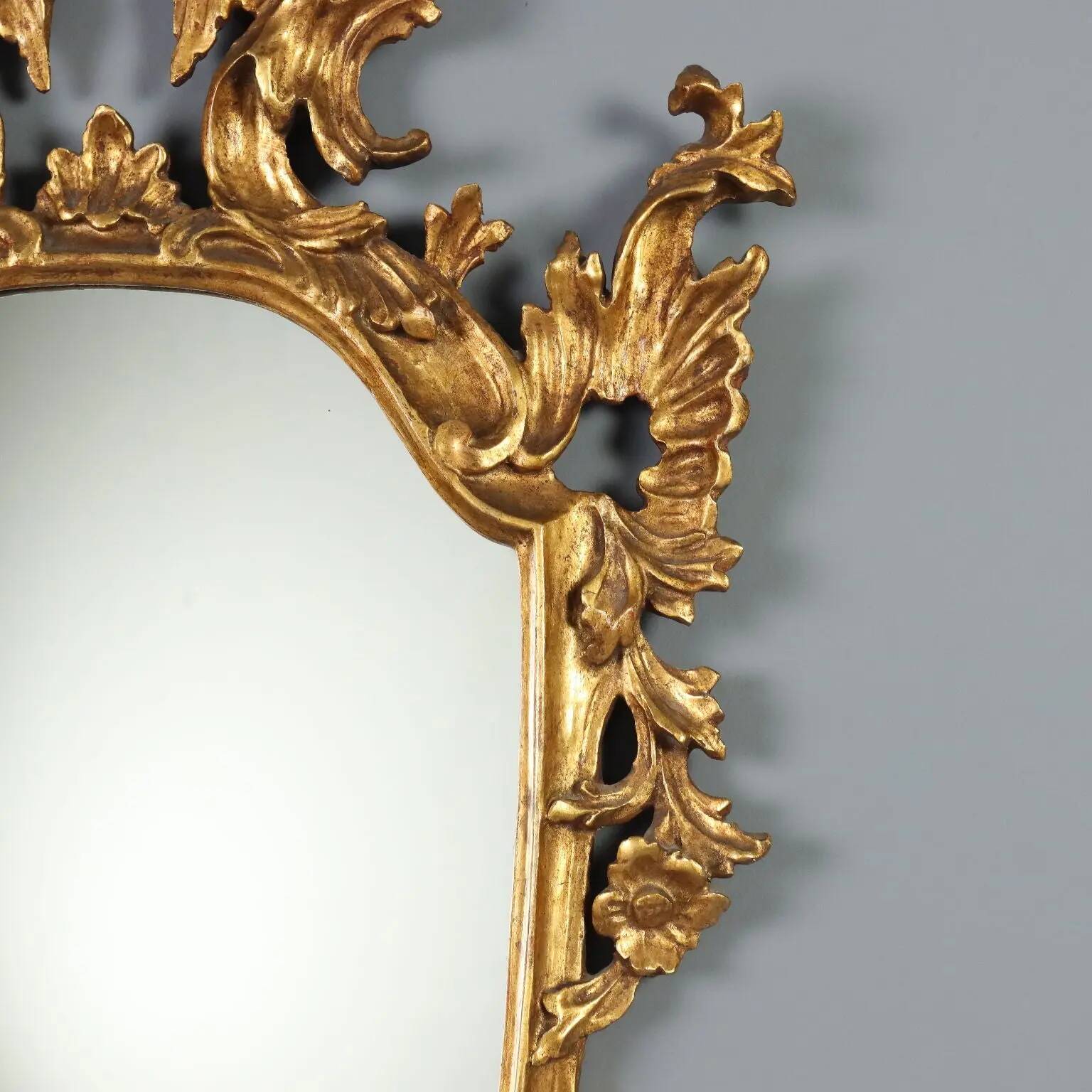 Antique carved and gilded wooden mirror, Italy, late 19th century.