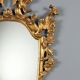 Antique carved and gilded wooden mirror, Italy, late 19th century.