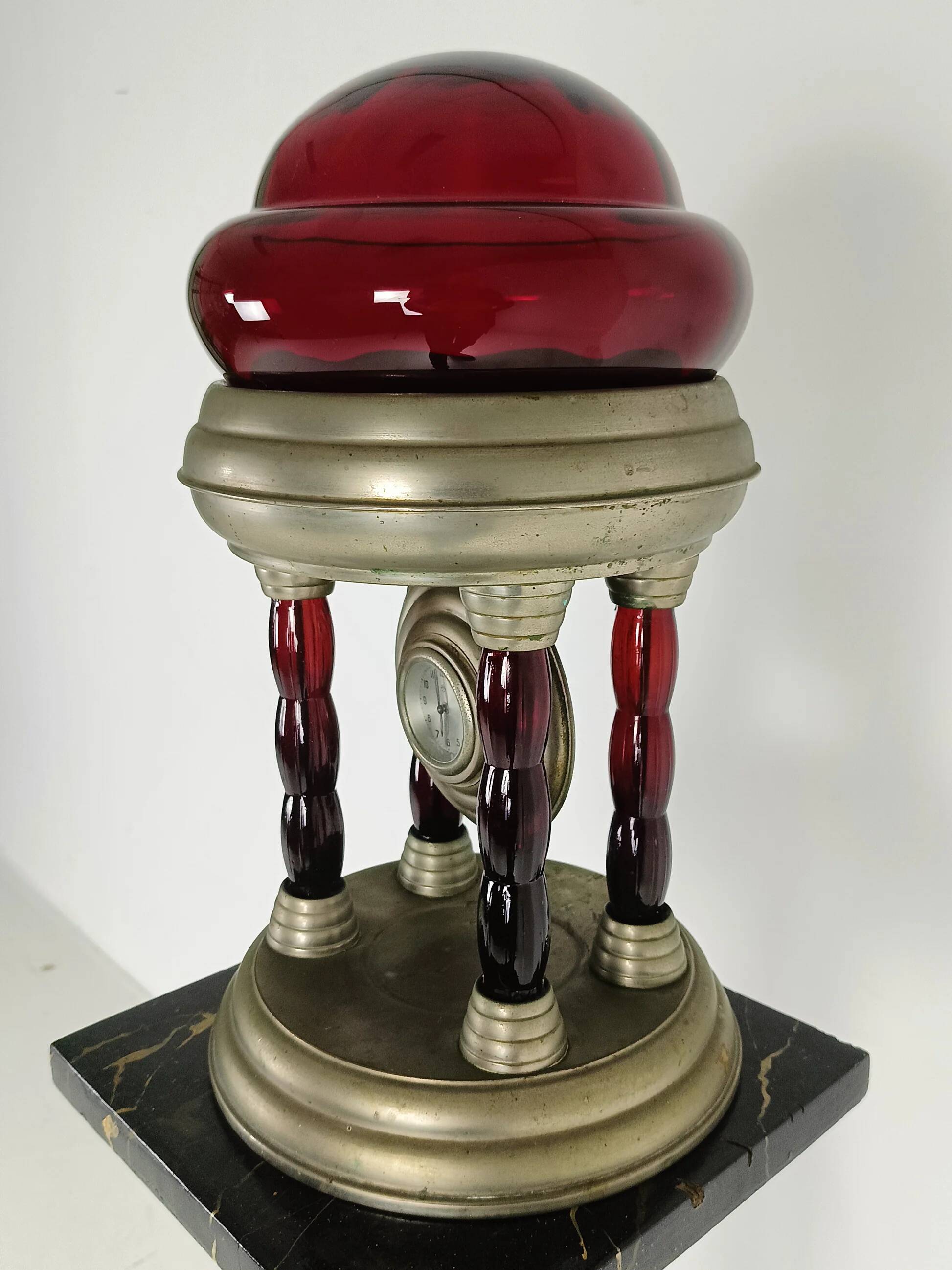 Unique vintage tin lamp with clockwork