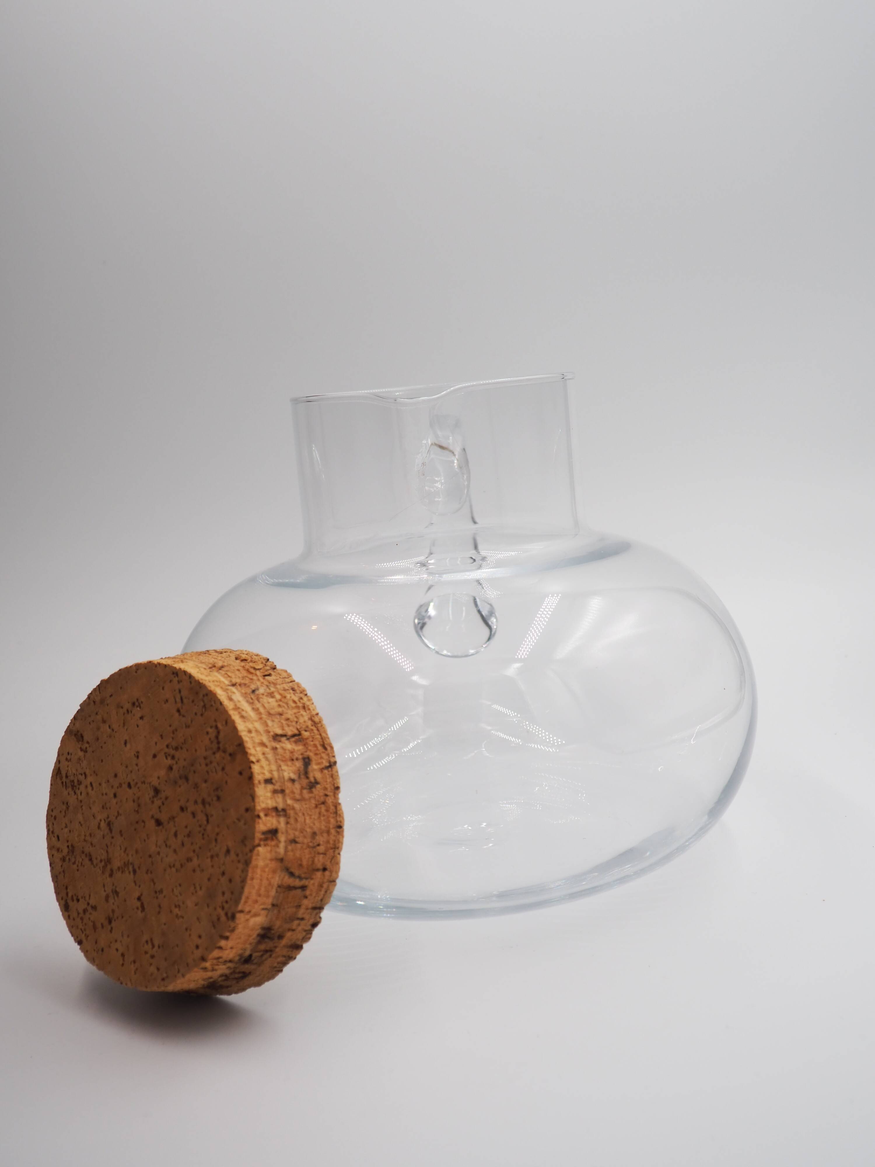 Round glass carafe with cork stopper