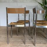 4 chrome and straw chairs