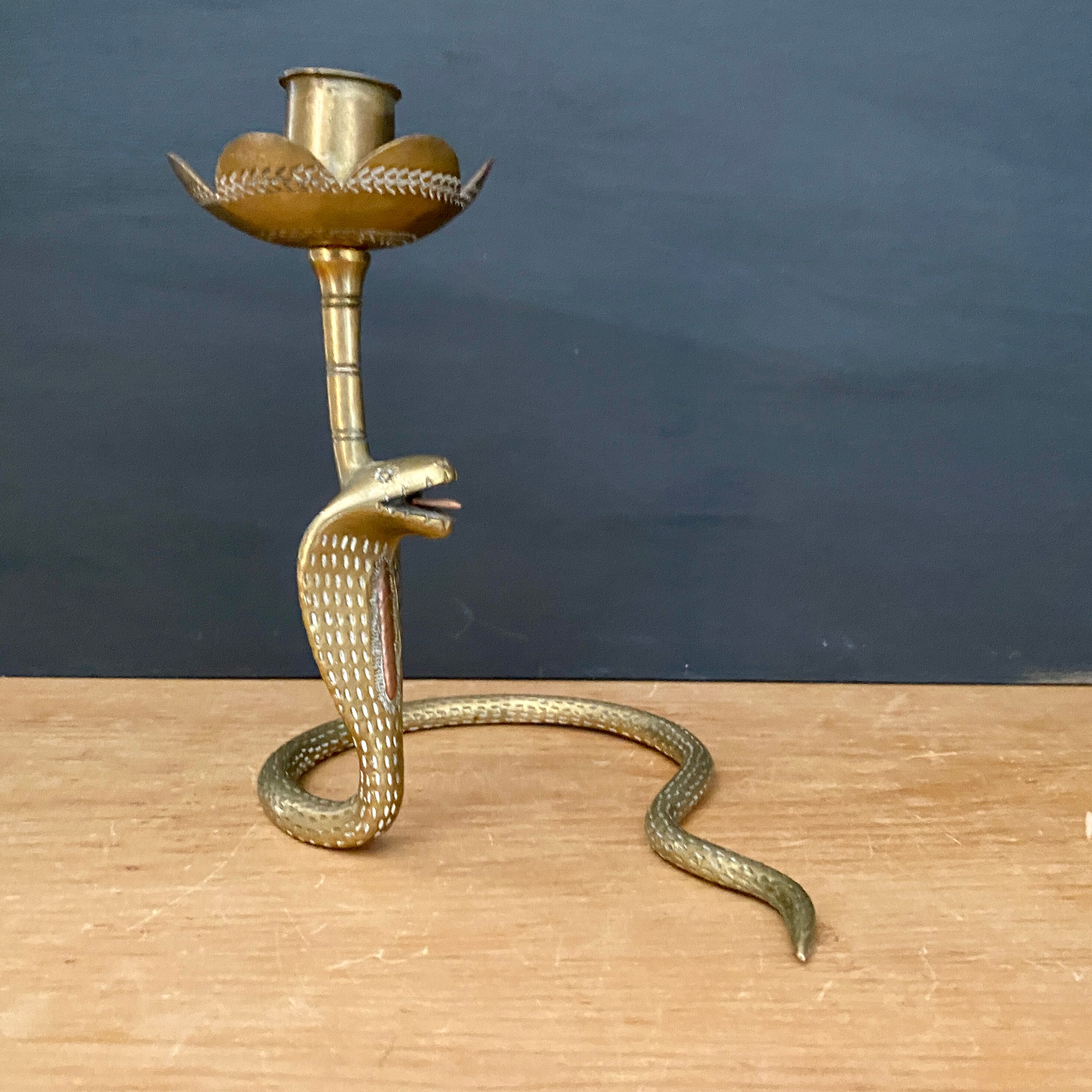 Brass candle holder in the shape of cobra -snake