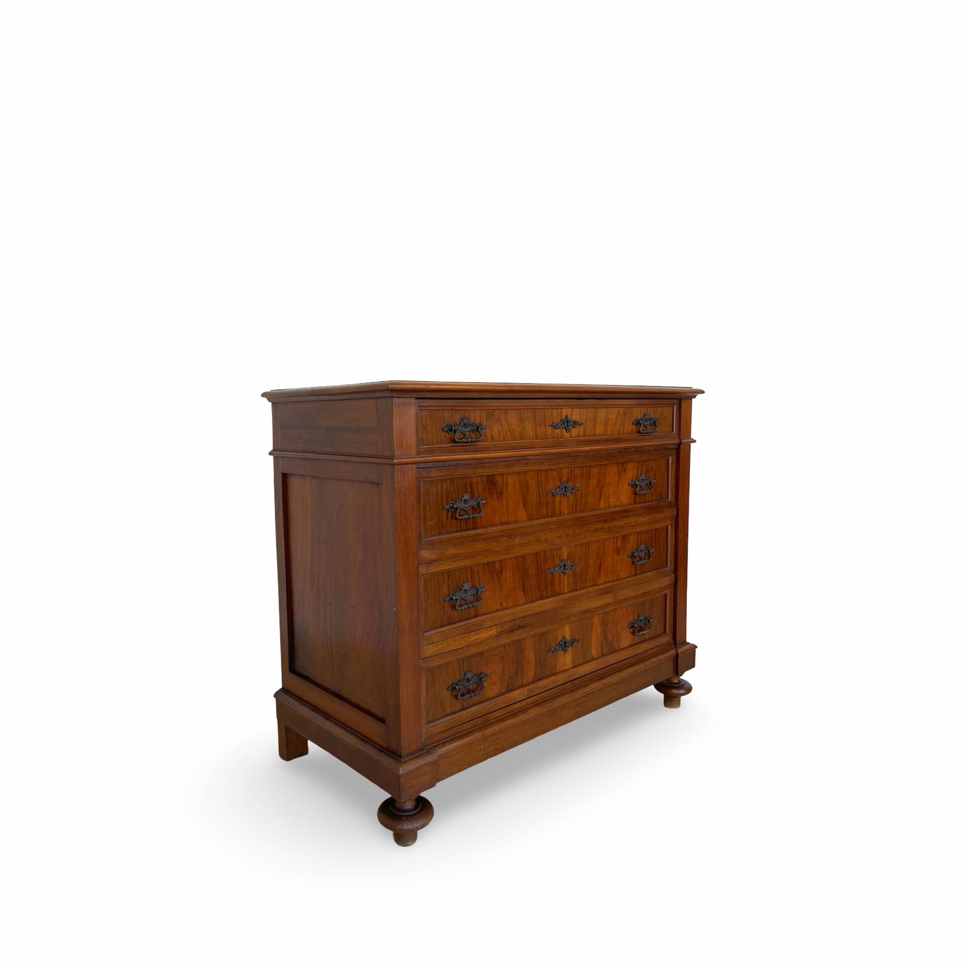 Antique walnut commode with bronze handles in the shape of a lion's mask,