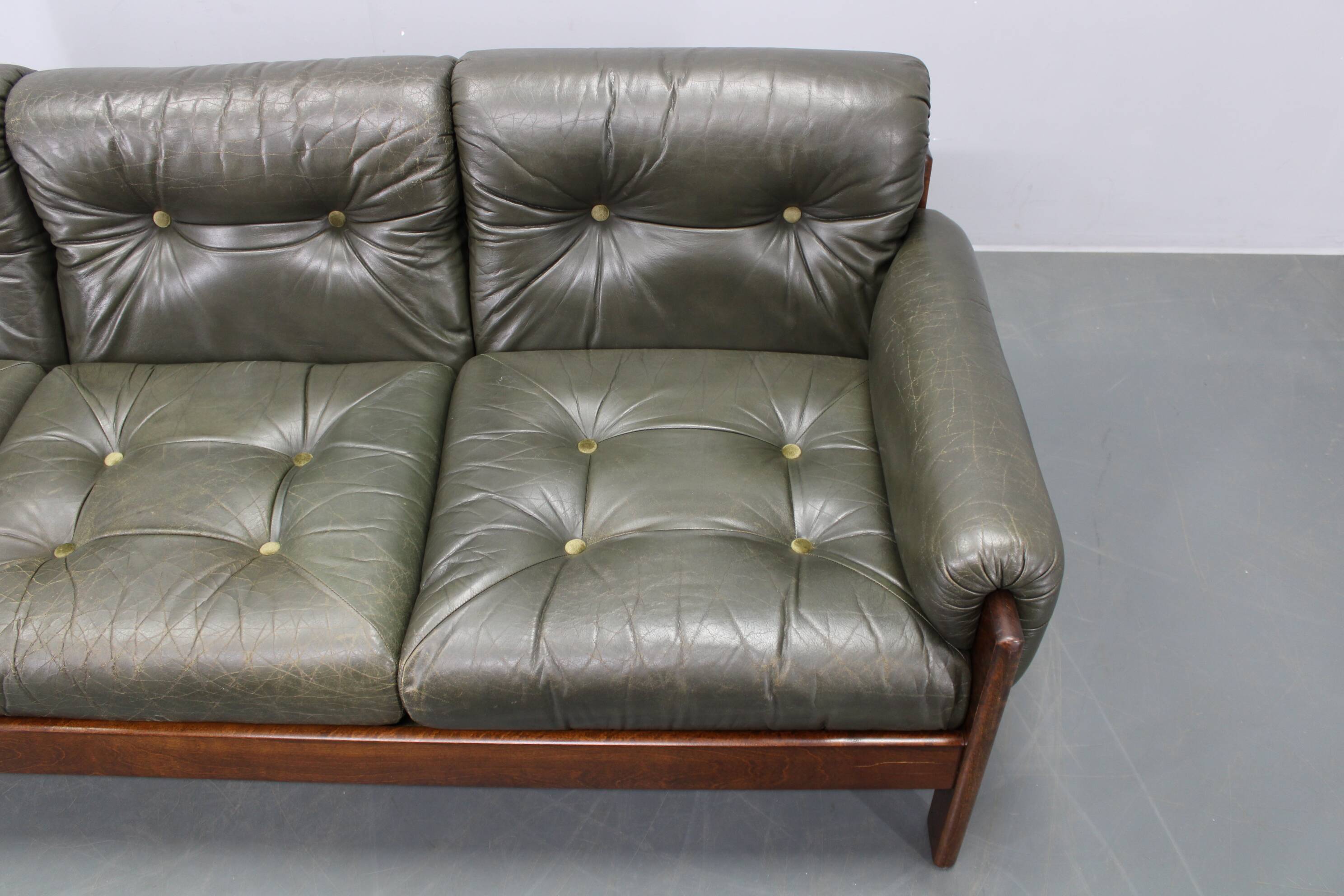 Mid-century Czechoslovak green leather sofa, 1970s