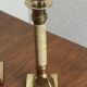 Pair of brass and stone candlesticks