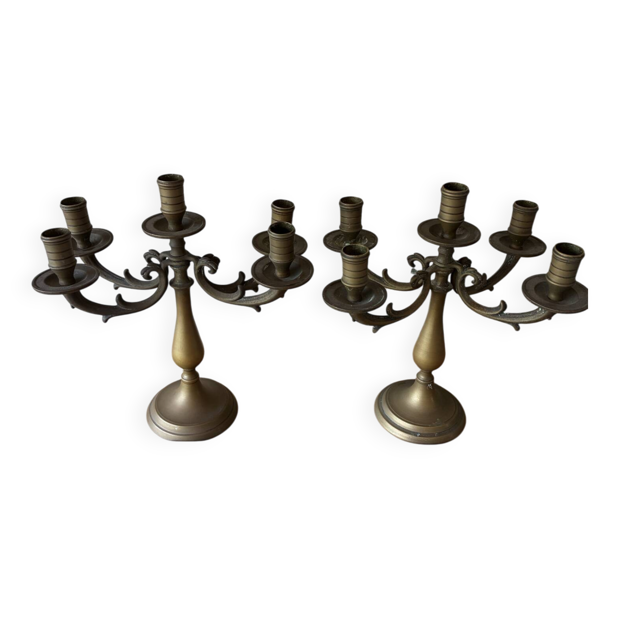 Pair of large 5-light candlesticks in patinated brass, classical style.
