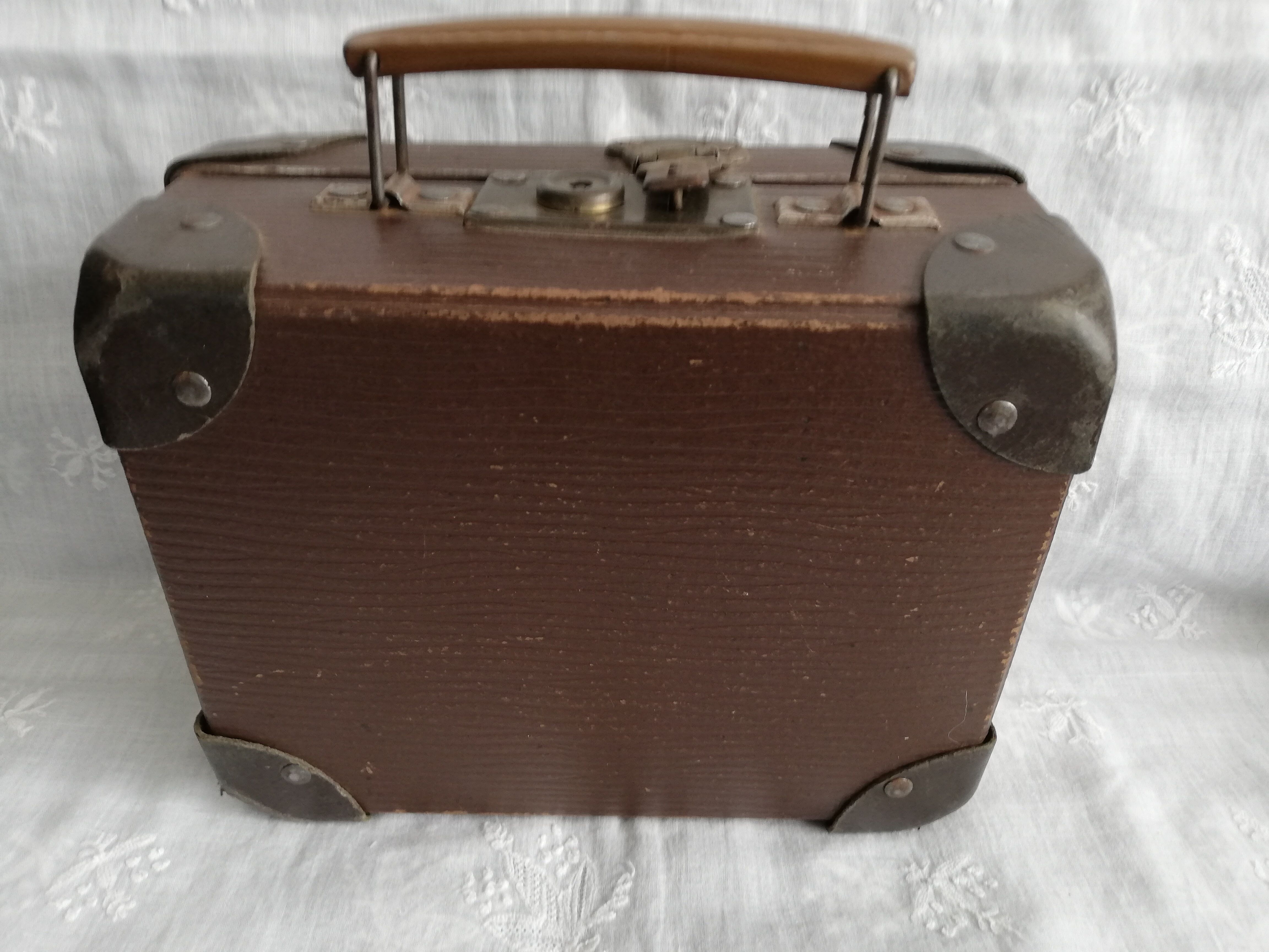 Old metal cardboard suitcase