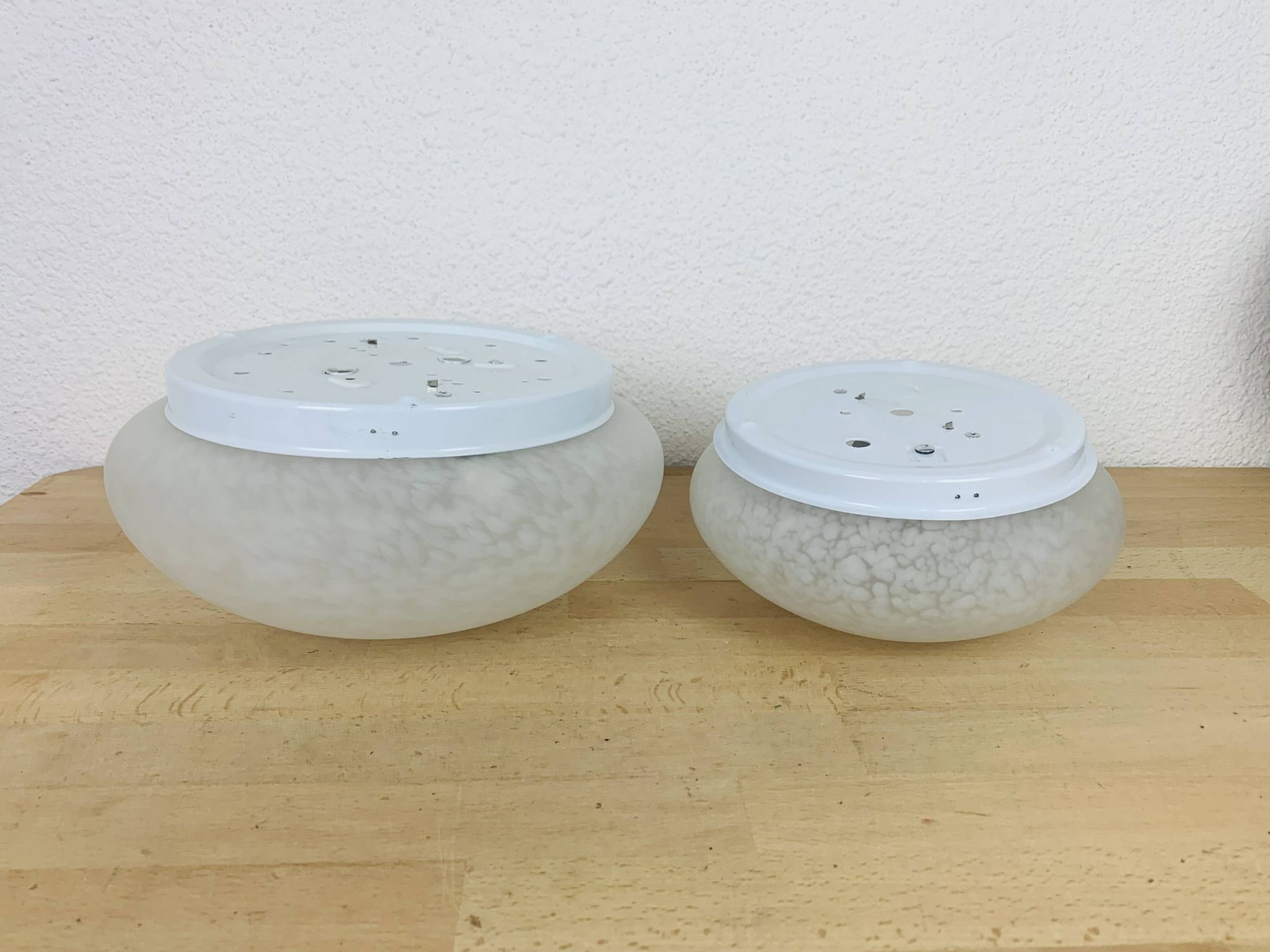Pair of speckled glass ball wall lights from Vianne, half sphere