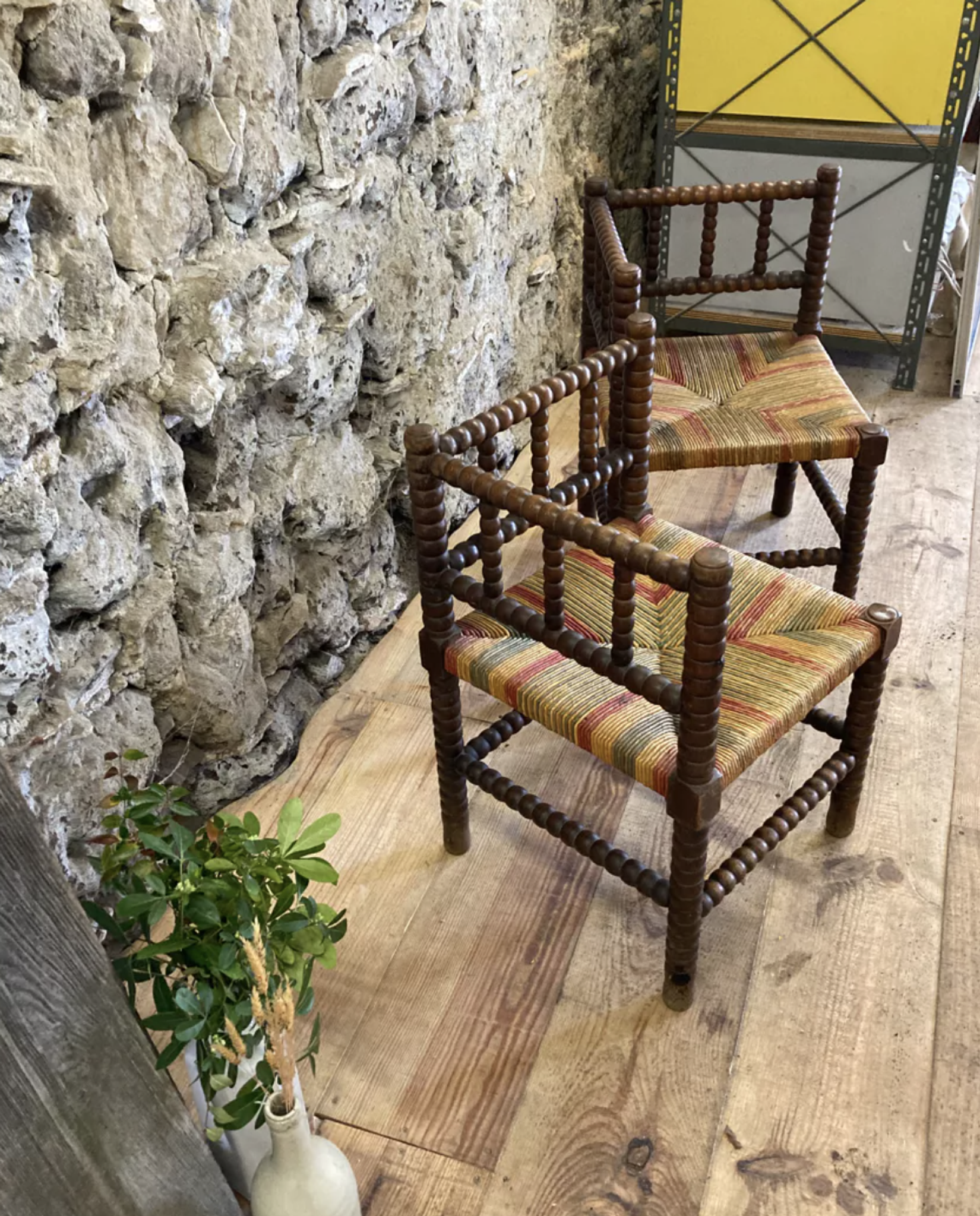 Pair of corner armchairs paillés in turned wood antique multicolored seat