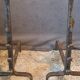 Pair of fire dogs, bucket andirons from the 19th century.