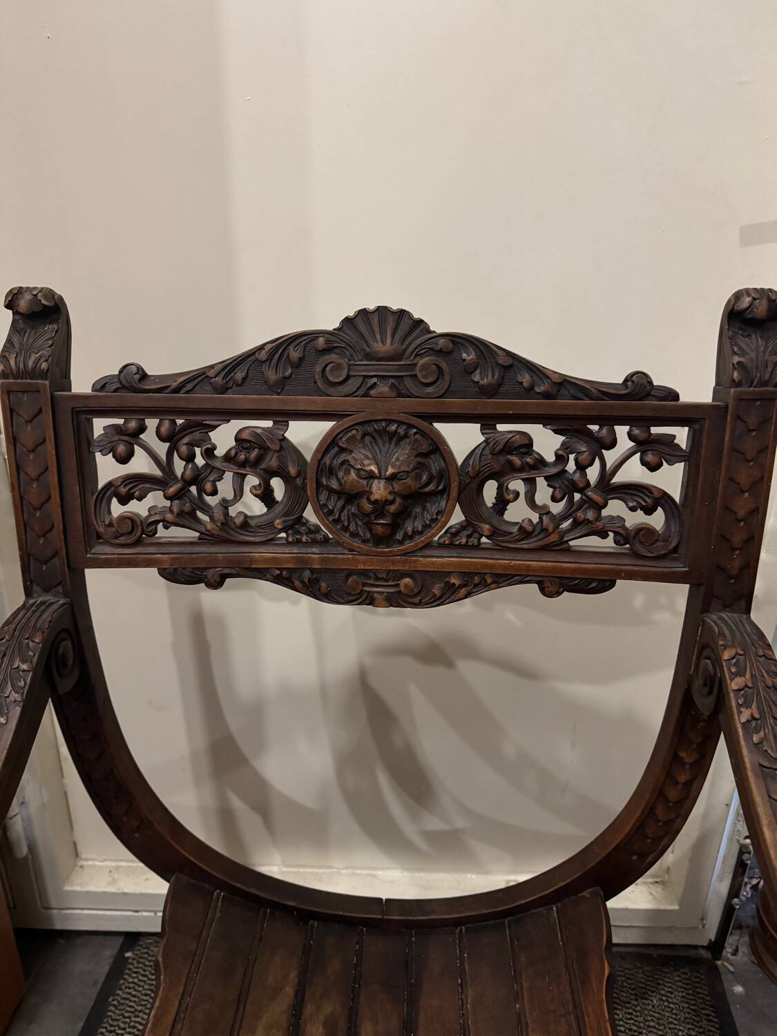 Curule Dagobert armchair in walnut