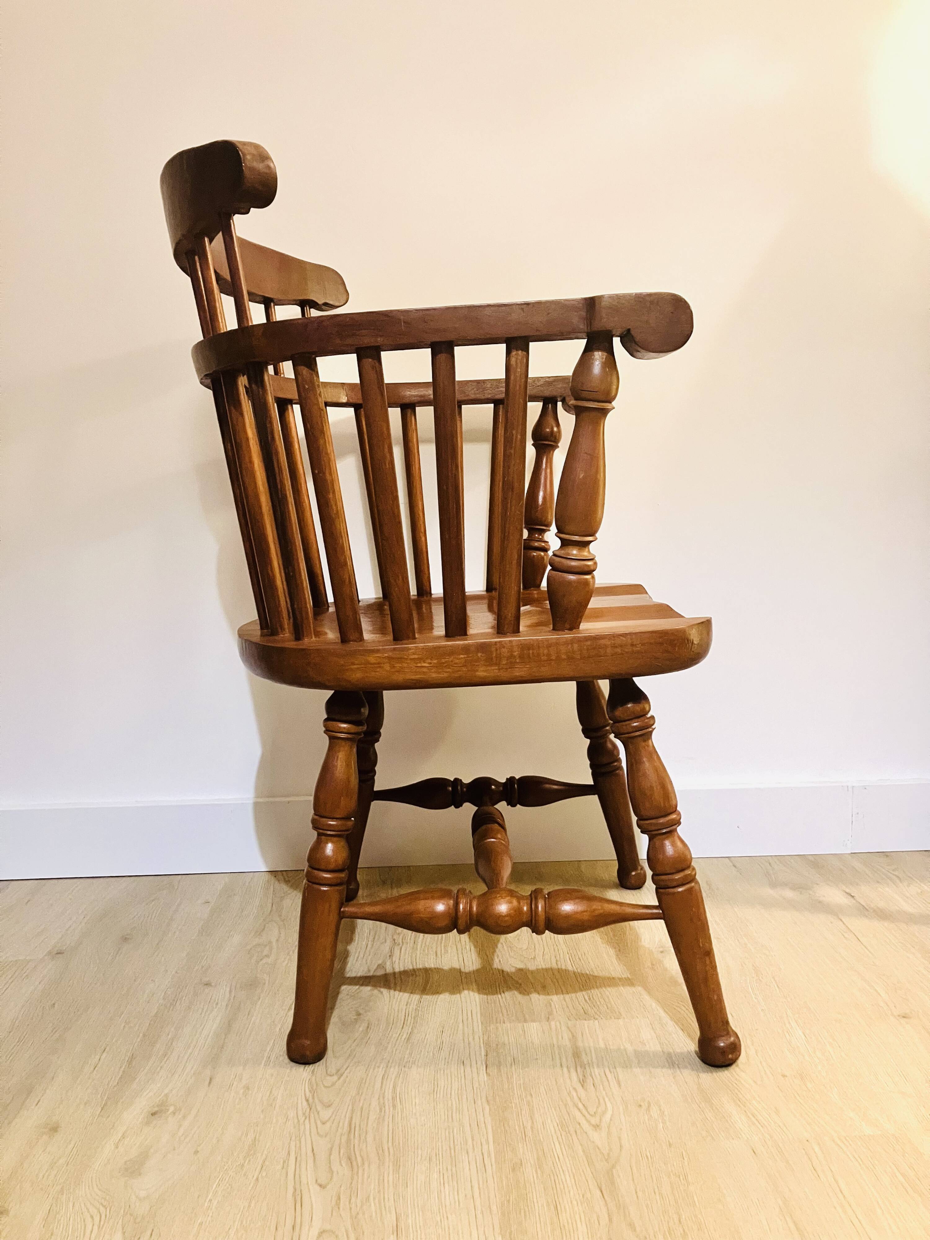 Solid wood chair with armrests