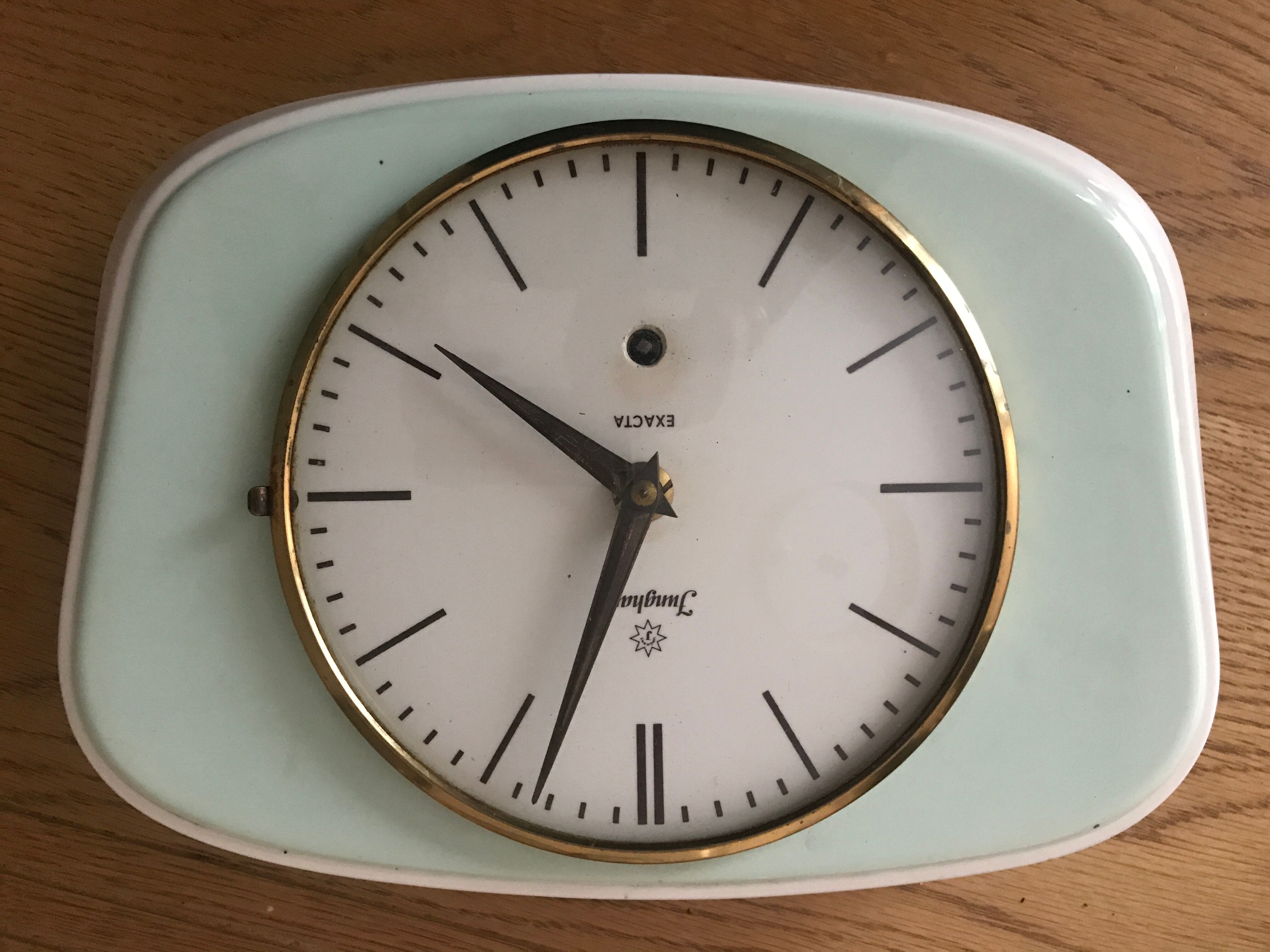 Vintage mint green earthenware clock