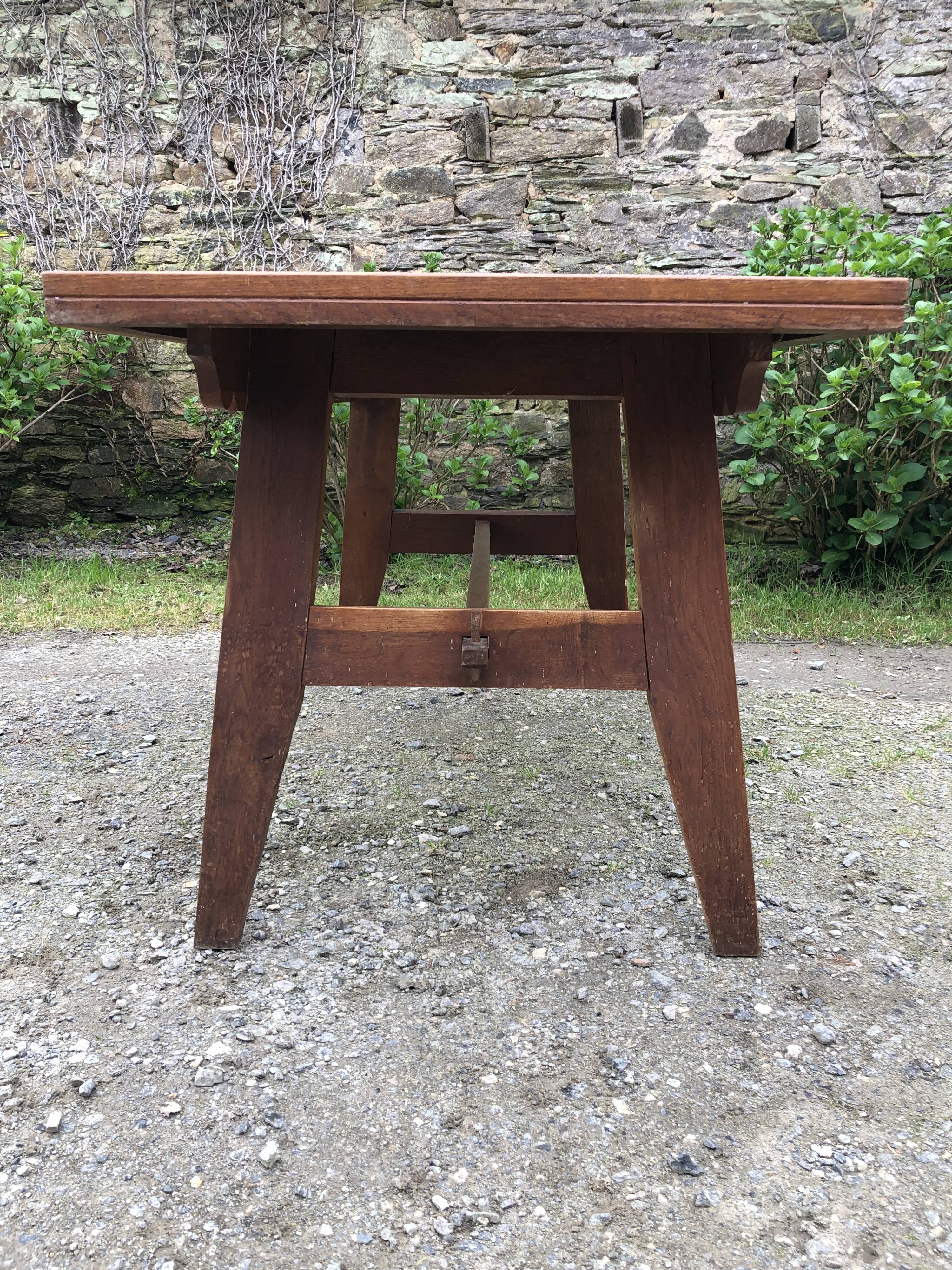 Vintage René Gabriel oak table from the reconstruction period.