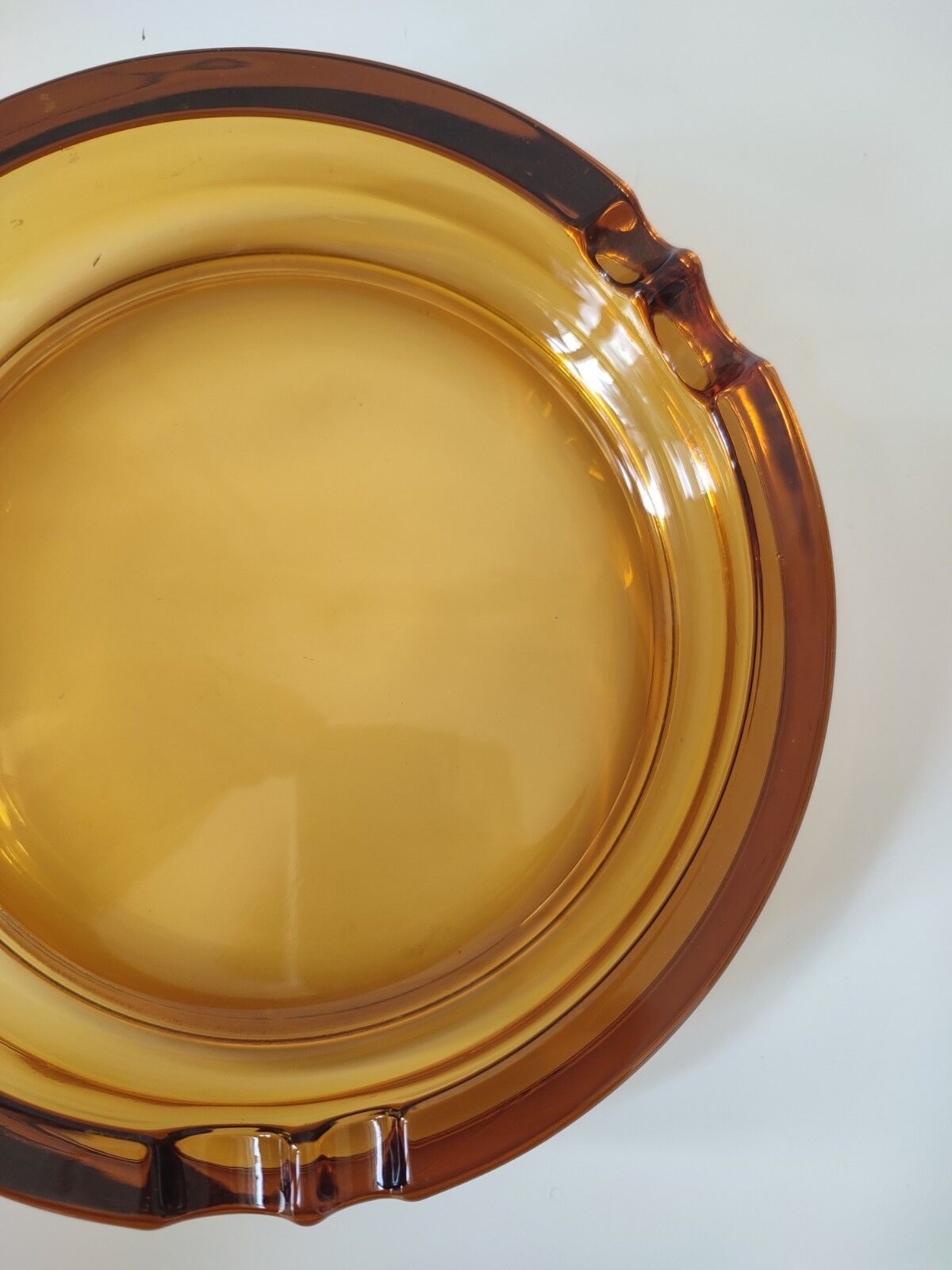 Amber glass ashtray