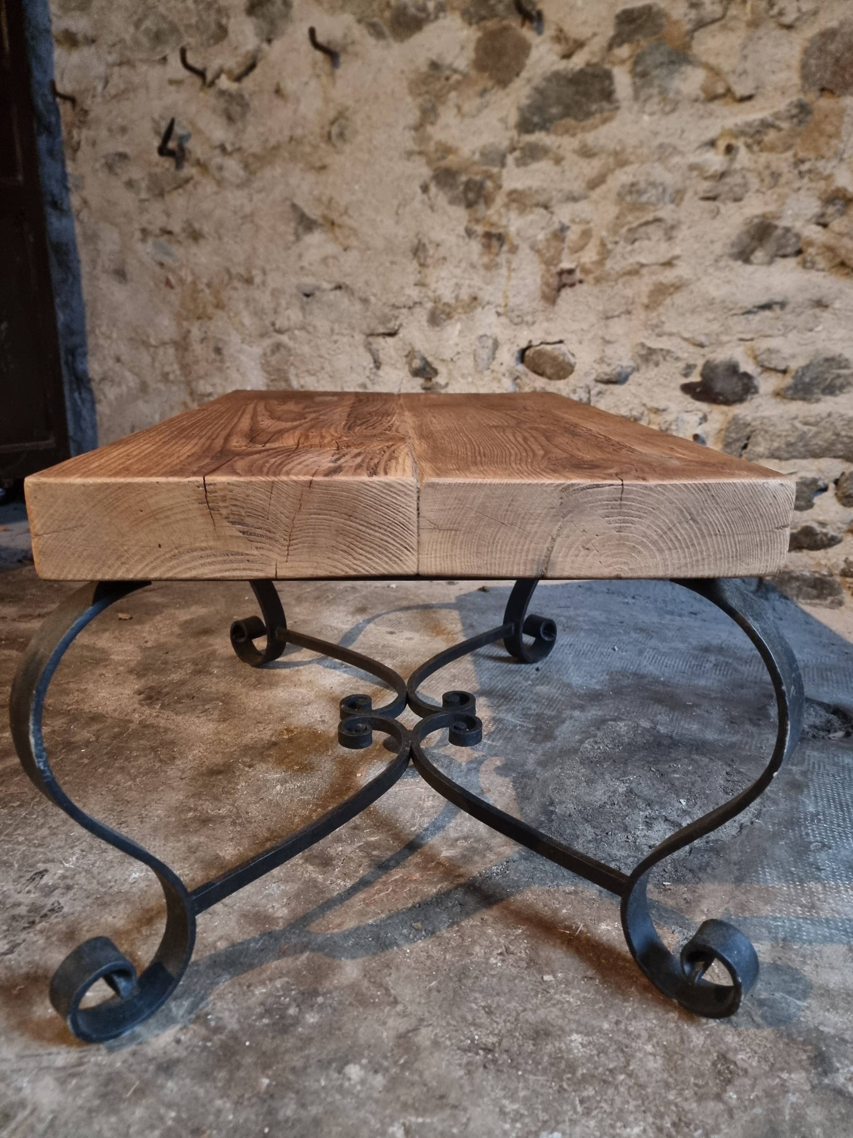 Vintage French coffee table from the 1960s – Rustic pine coffee table with a black iron base.