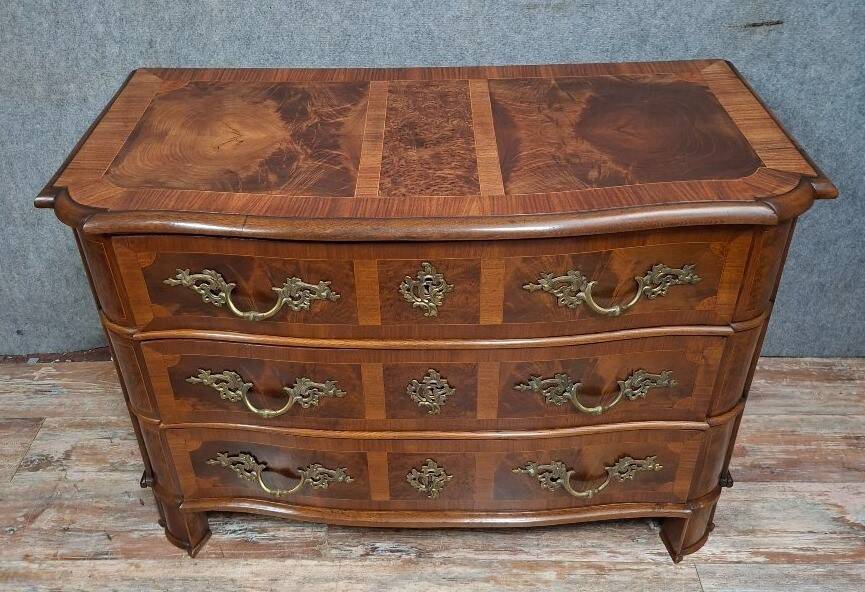 Curved commode from the Louis XIV period in marquetry - adorned with gilded bronze fittings.