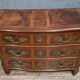 Curved commode from the Louis XIV period in marquetry - adorned with gilded bronze fittings.