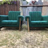 Duo of vintage armchairs with green fabrics.
