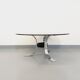 Vintage round coffee table in glass, chromed metal and black metal Space Age style of the 70s