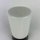 White cylindrical Art Deco chandelier RAAK with black support.