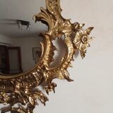 Antique mirror in gilded metal