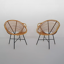 Pairs of rattan chairs