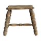 Antique wooden stool with four turned legs.