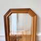 Miroir octogonal nervuré en bois doré