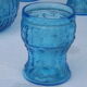 Set of jug and 10 blue glass goblets with floral motifs