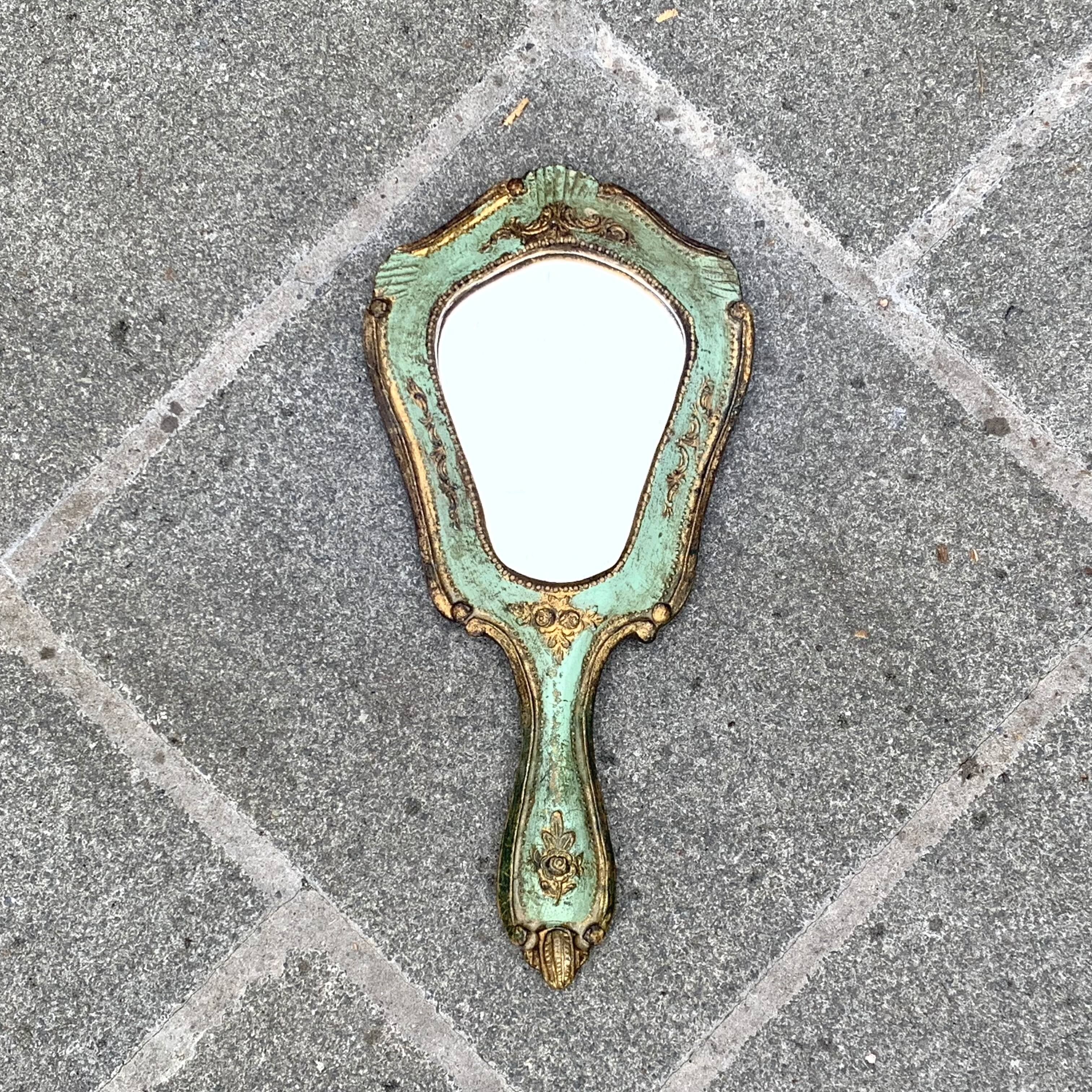 Old Florentine style carved wooden hand mirror