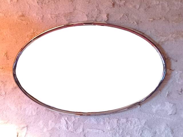 Oval art deco mirror with vintage chrome frame from the 70s