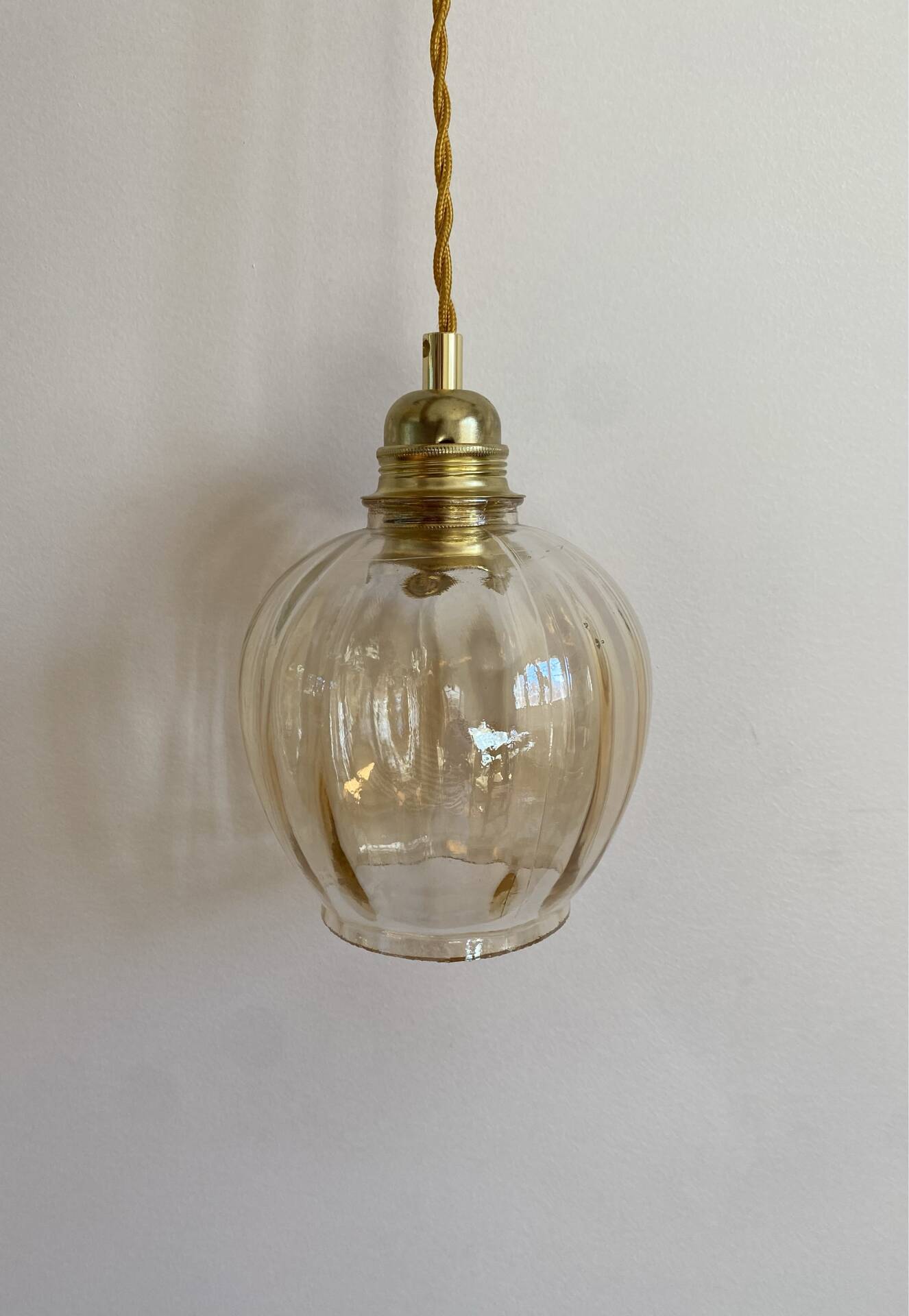 Vintage amber glass suspension globe