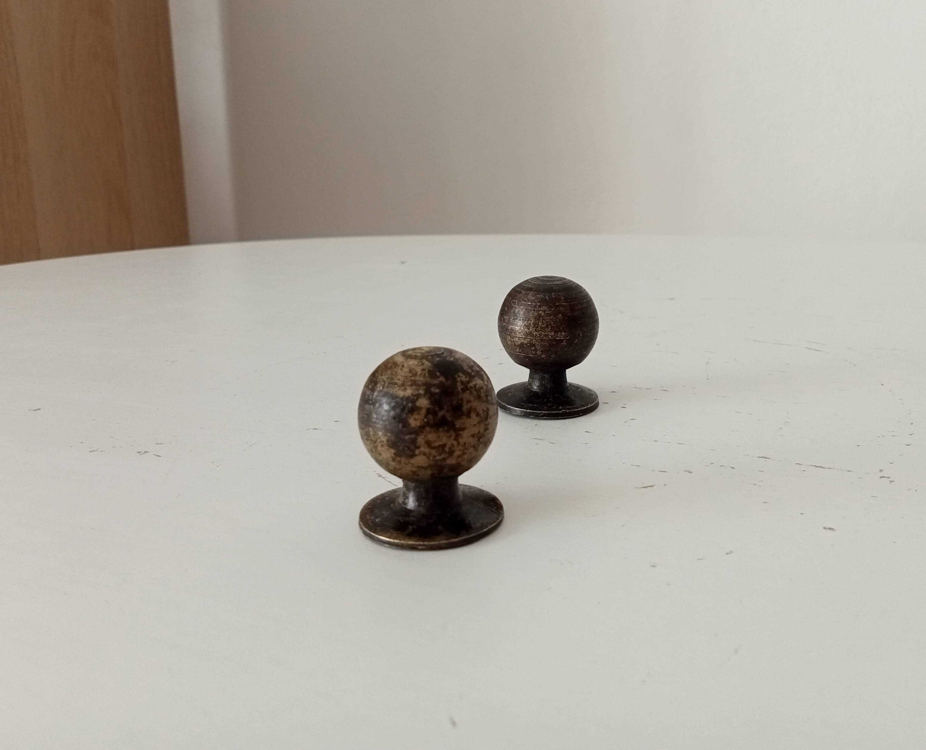 Pair of antique bronze furniture handles.