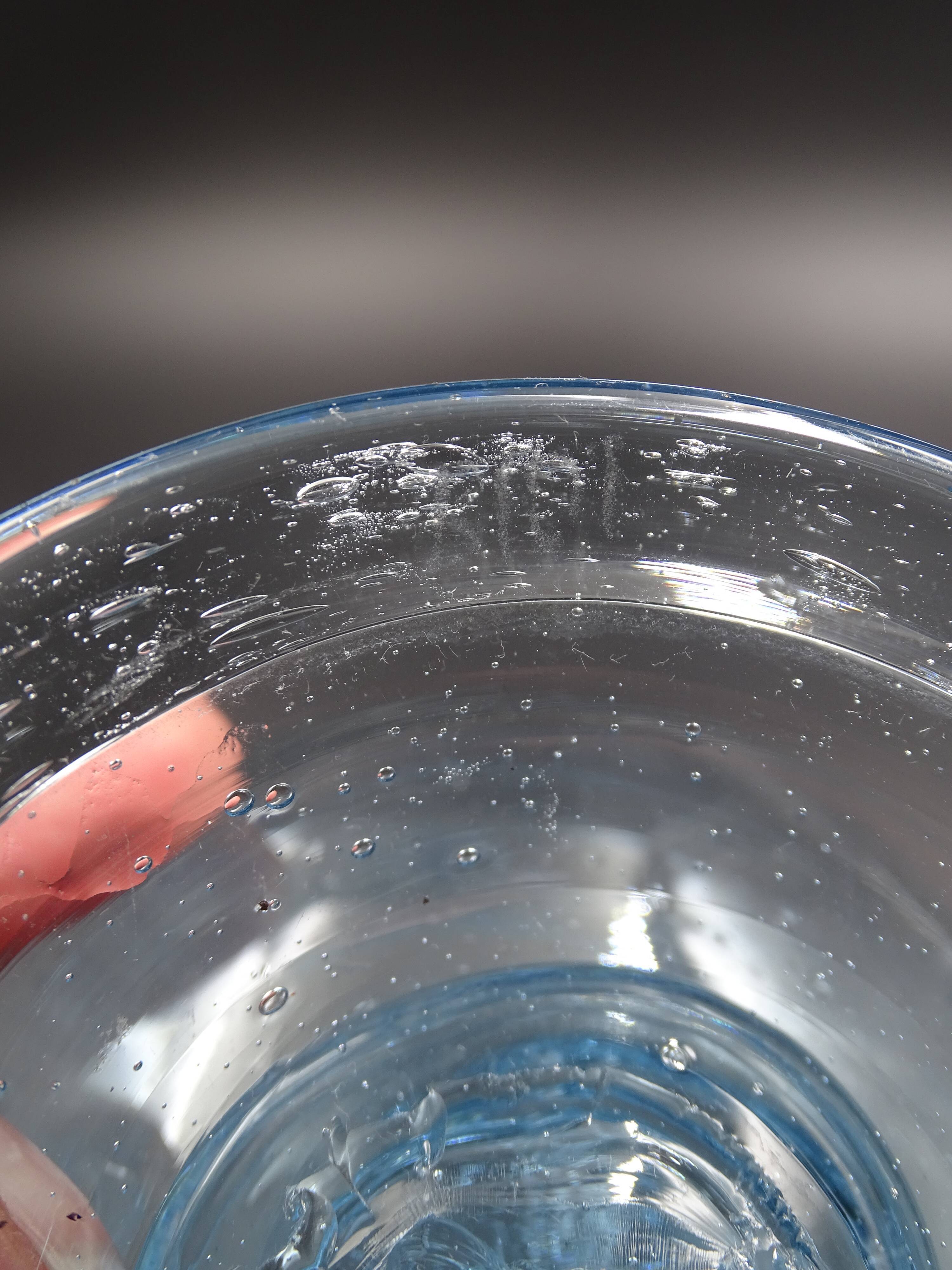 Candlestick or photophore in sky blue bulled glass, signed Biot