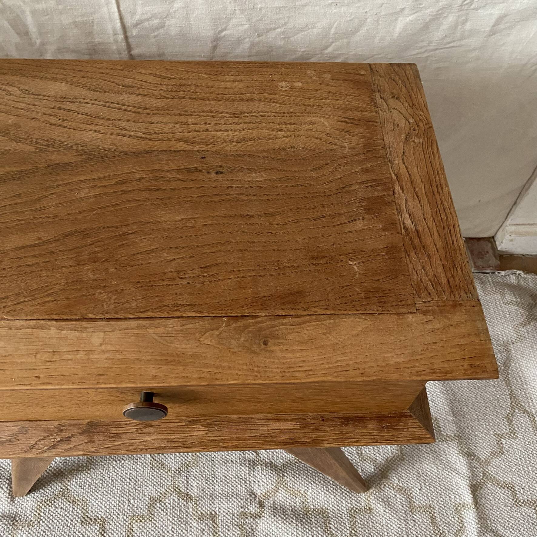 Scandinavian style bedside table with tapered legs from the 1960s.