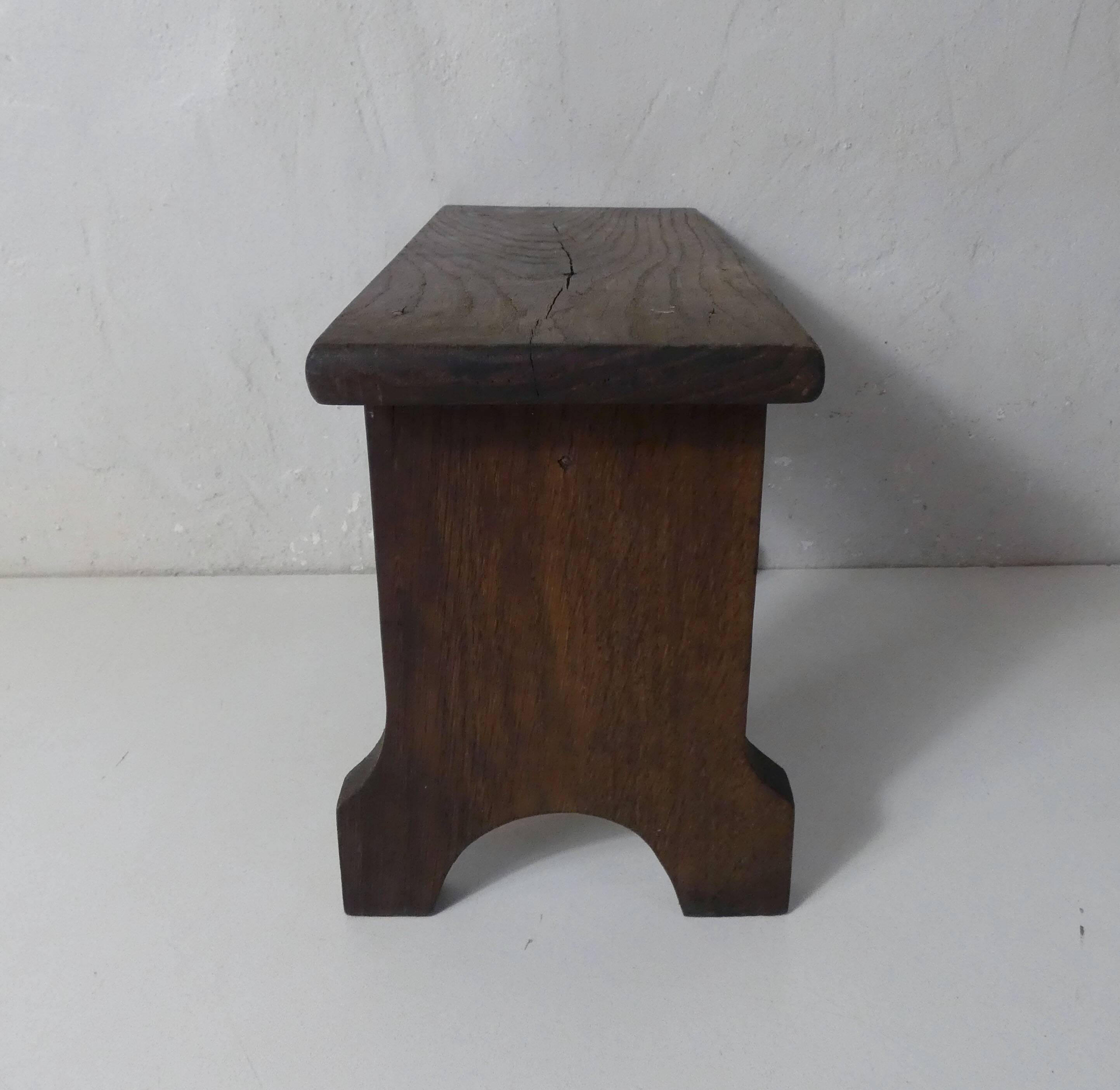 old small wooden bench step