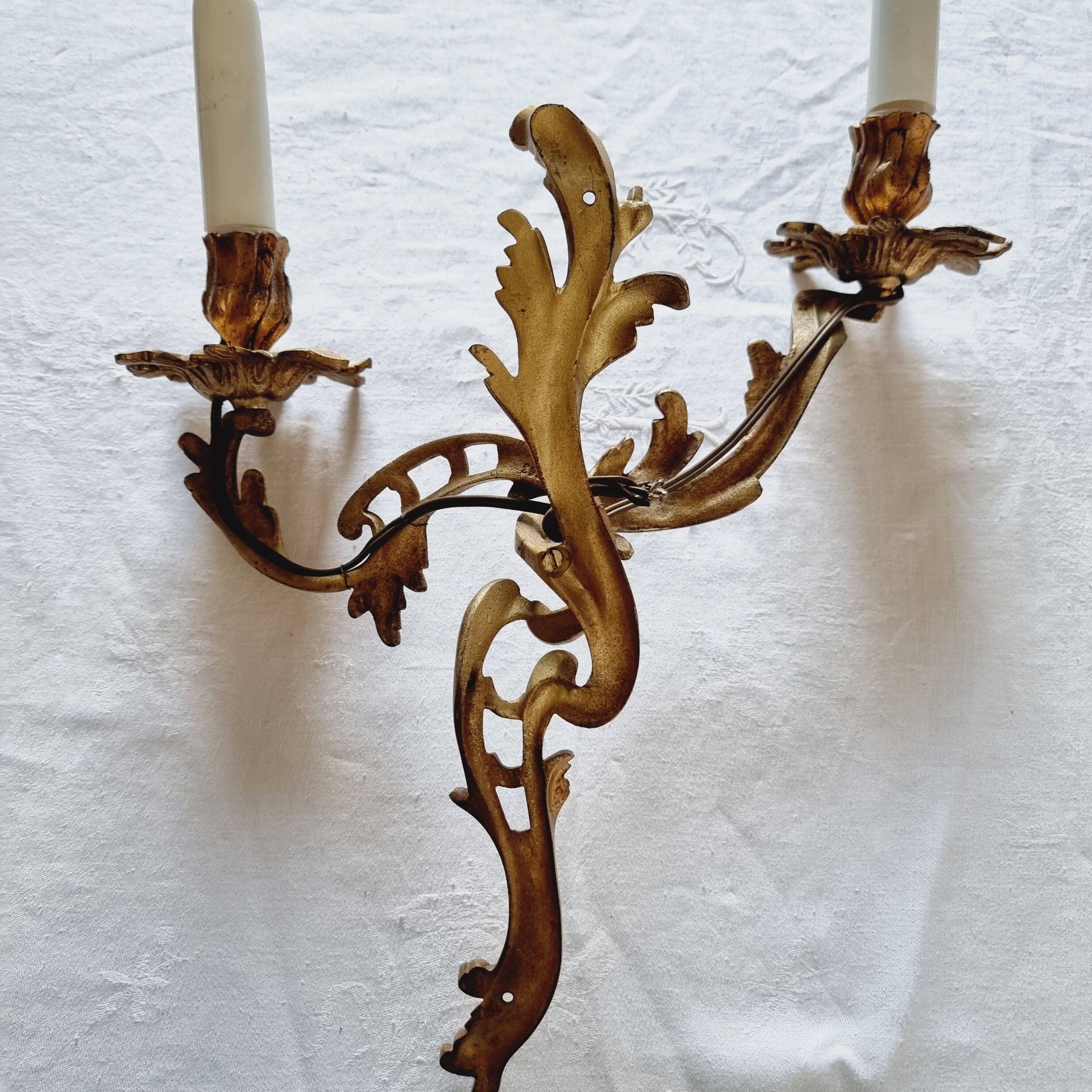 Pair of vintage French wall sconces in bronze, Louis XV Rococo style.