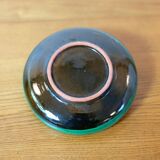 Glazed green earthenware candlestick